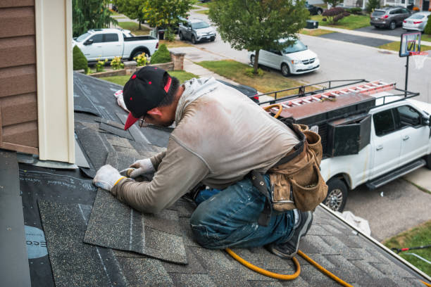 Professional Roofing technician working in New Castle, NH